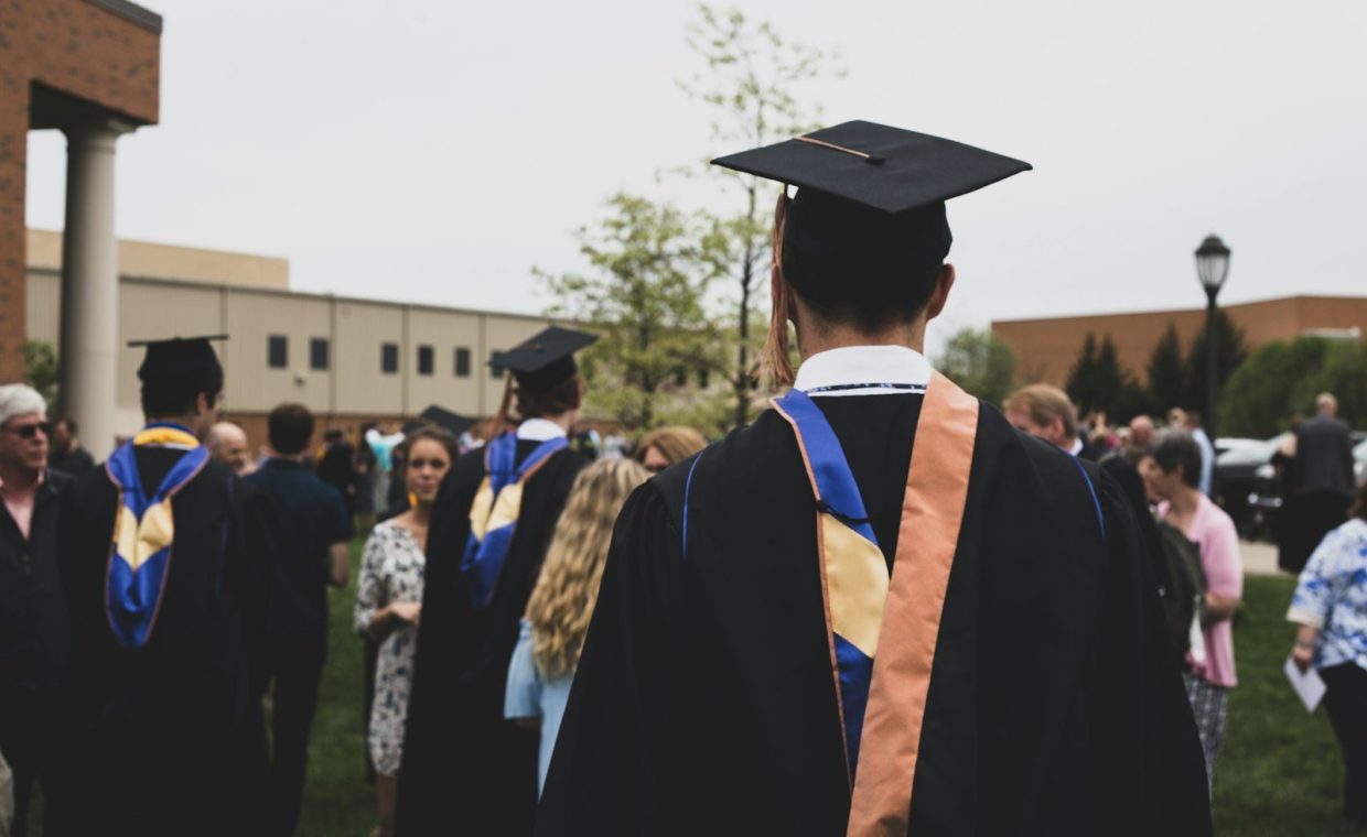 man wearing academic gown